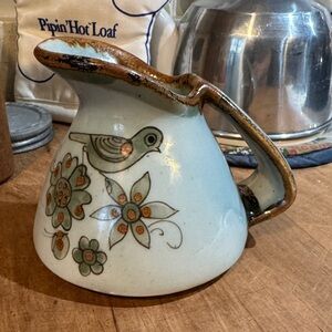 Artisan Ceramic Pitcher with Bird and Floral Motif